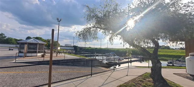 a view of a swimming pool with a patio