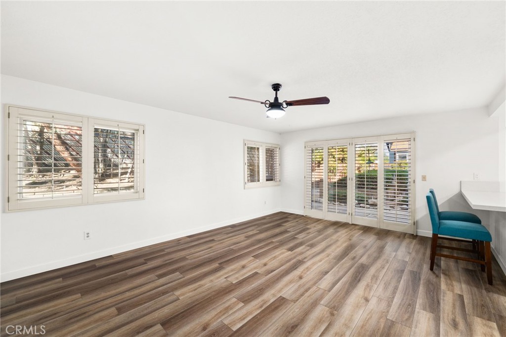 162 Lakeside Avenue Redlands, CA 92373 - Photo 12 of 32 a view of wooden floor and windows in a room