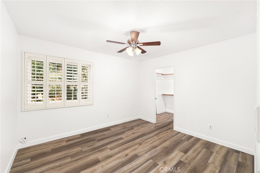162 Lakeside Avenue Redlands, CA 92373 - Photo 20 of 32 a view of a room with a ceiling fan and a window