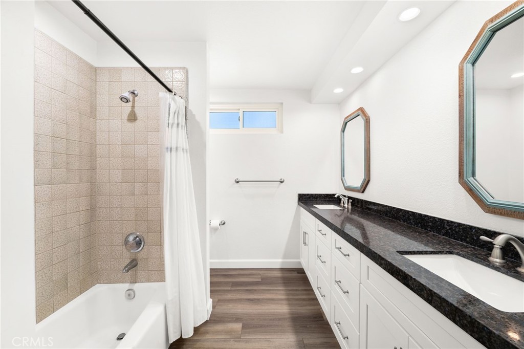 162 Lakeside Avenue Redlands, CA 92373 - Photo 22 of 32 a spacious bathroom with a granite countertop sink a toilet and shower