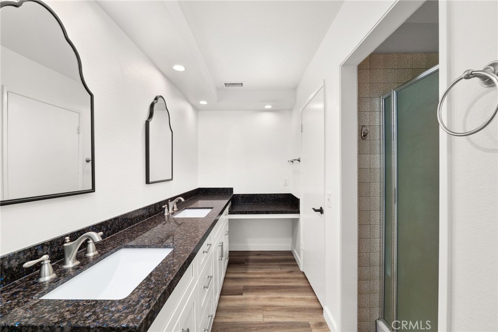 162 Lakeside Avenue Redlands, CA 92373 - Photo 27 of 32 a bathroom with a sink and a mirror
