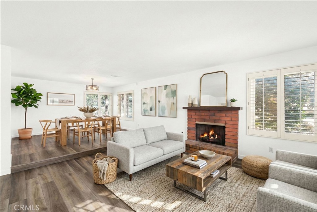 162 Lakeside Avenue Redlands, CA 92373 - Photo 3 of 32 a living room with furniture and a fireplace