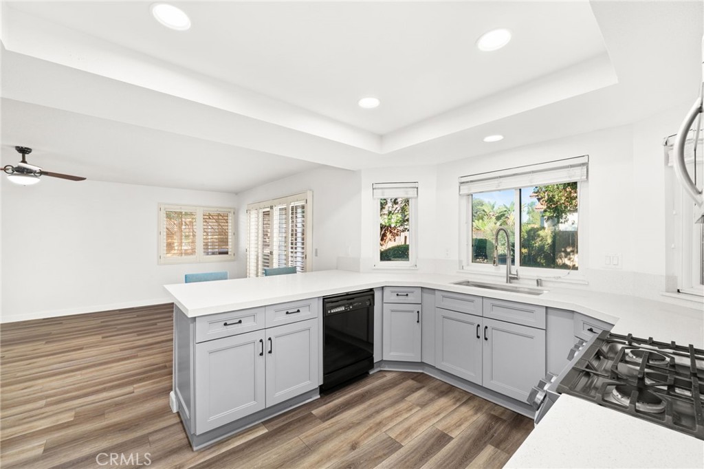 162 Lakeside Avenue Redlands, CA 92373 - Photo 7 of 32 a kitchen with sink stove and cabinets