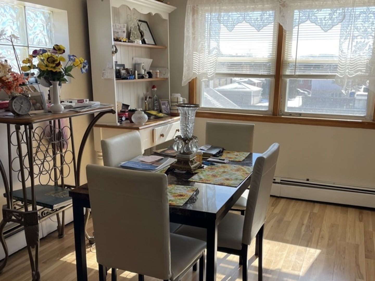 5325 West 53rd Place Chicago, IL 60638 - Photo 14 of 25 a view of a dining room with furniture window and outside view