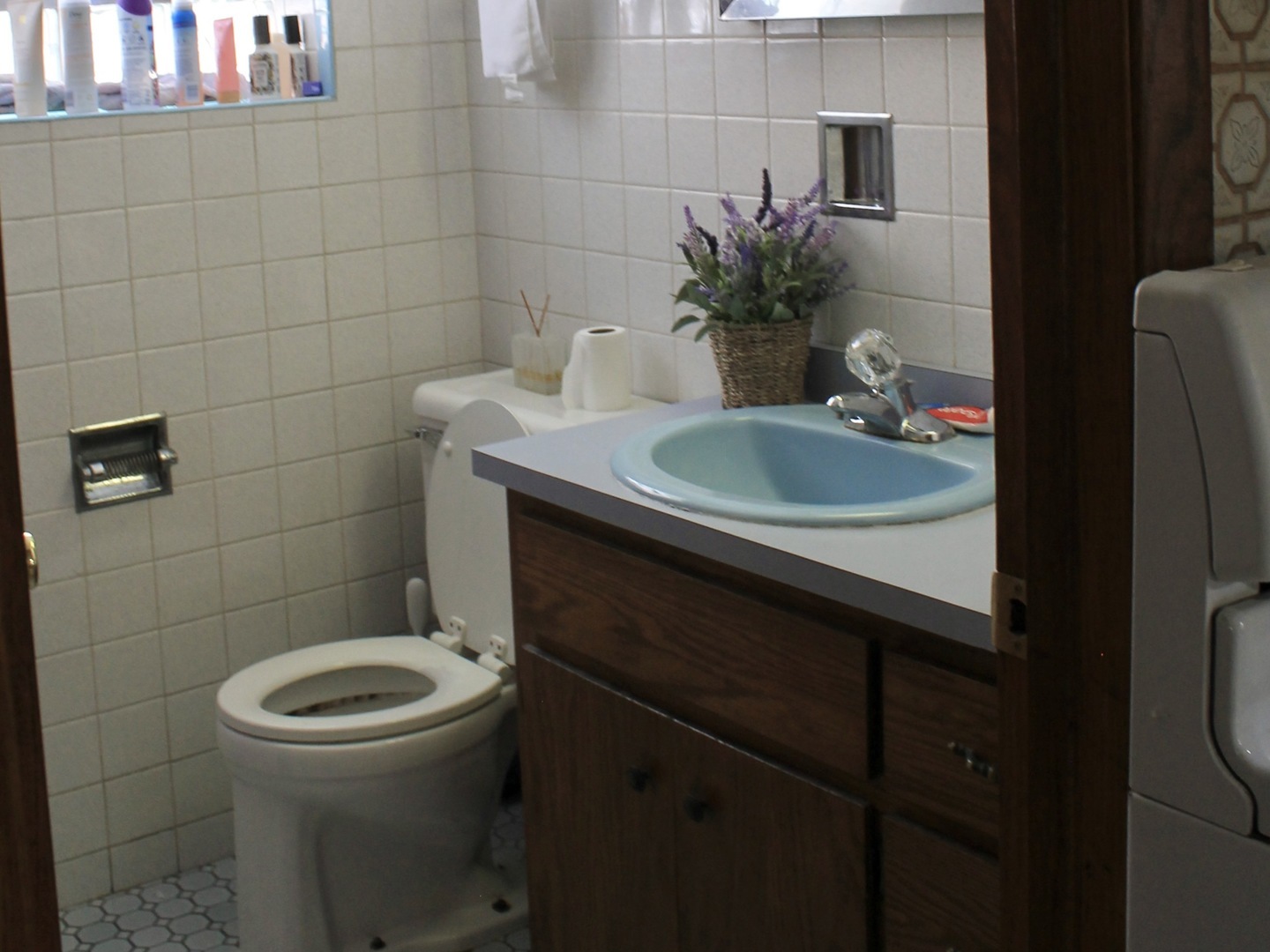 5325 West 53rd Place Chicago, IL 60638 - Photo 18 of 25 a bathroom with a sink a toilet and a mirror