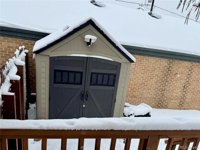 a view of a livingroom with furniture and windows