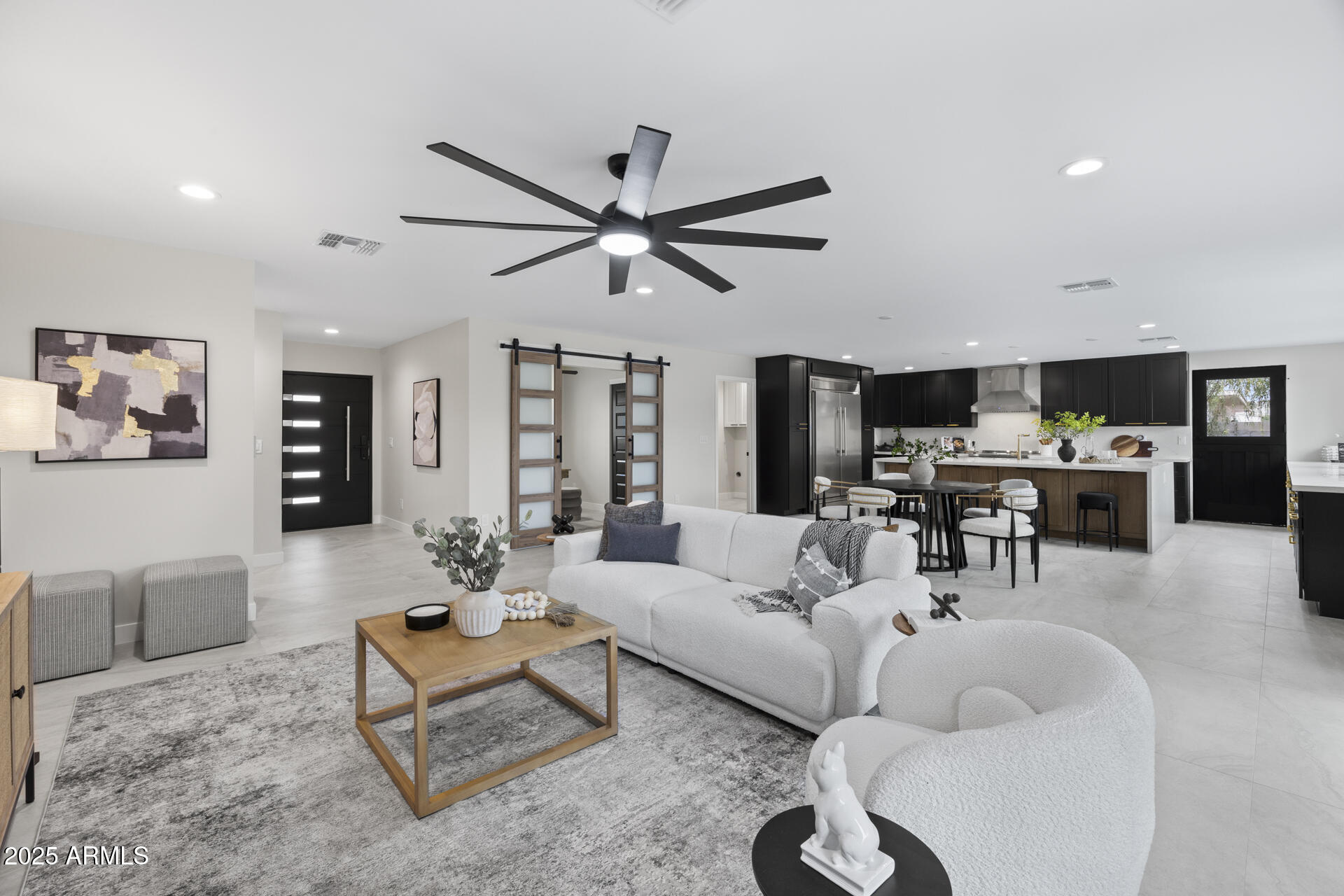 4059 East Cholla Street Phoenix, AZ 85028 - Photo 14 of 70 a living room with furniture a ceiling fan and a rug