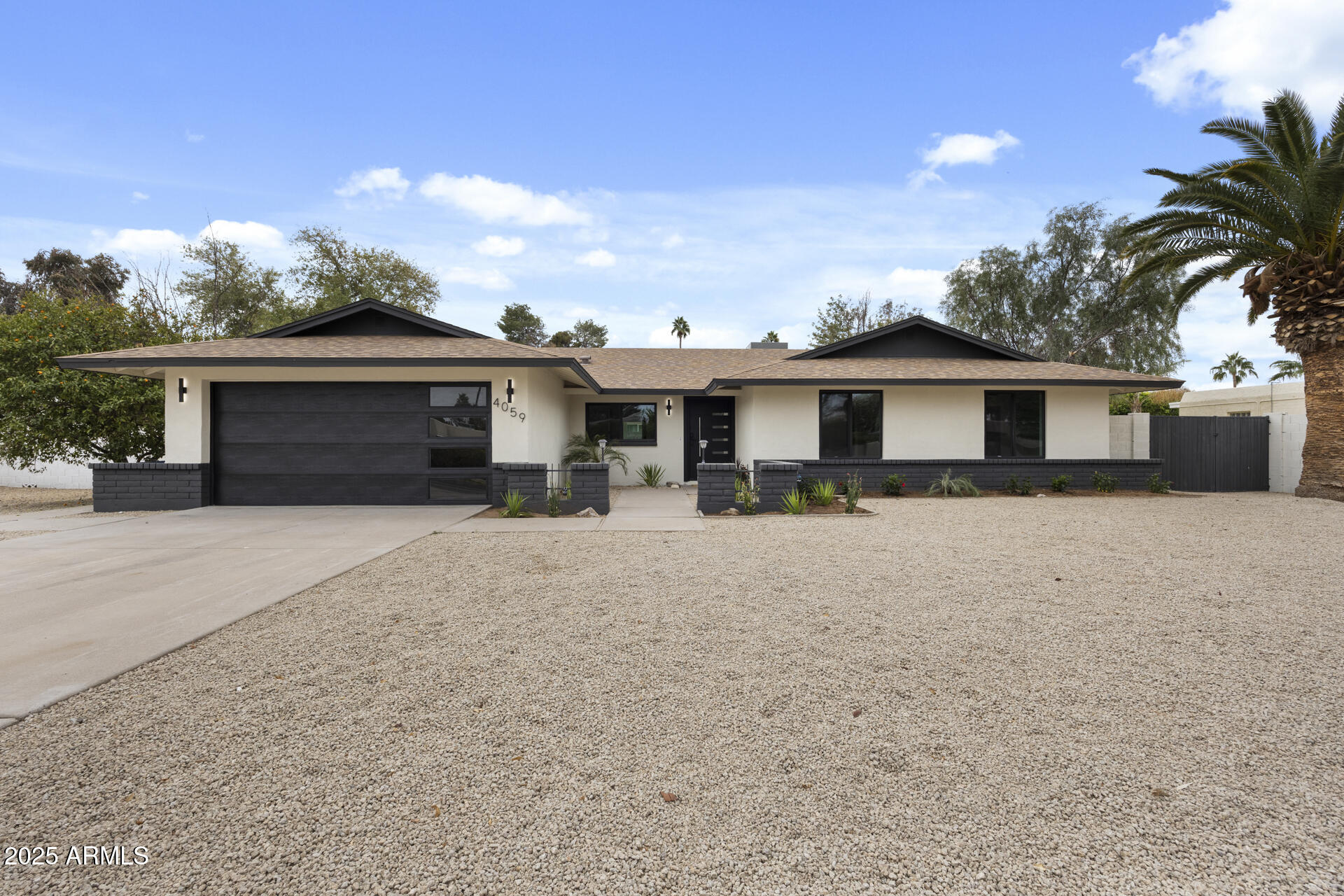 4059 East Cholla Street Phoenix, AZ 85028 - Photo 2 of 70 front view of a house with a street