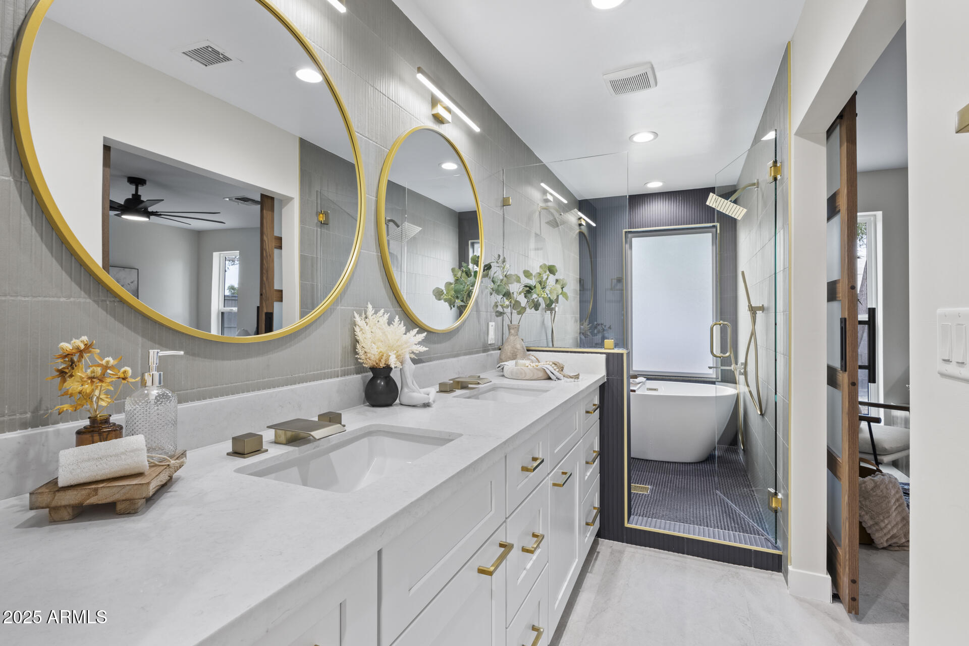4059 East Cholla Street Phoenix, AZ 85028 - Photo 57 of 70 a bathroom with a double vanity sink mirror and shower