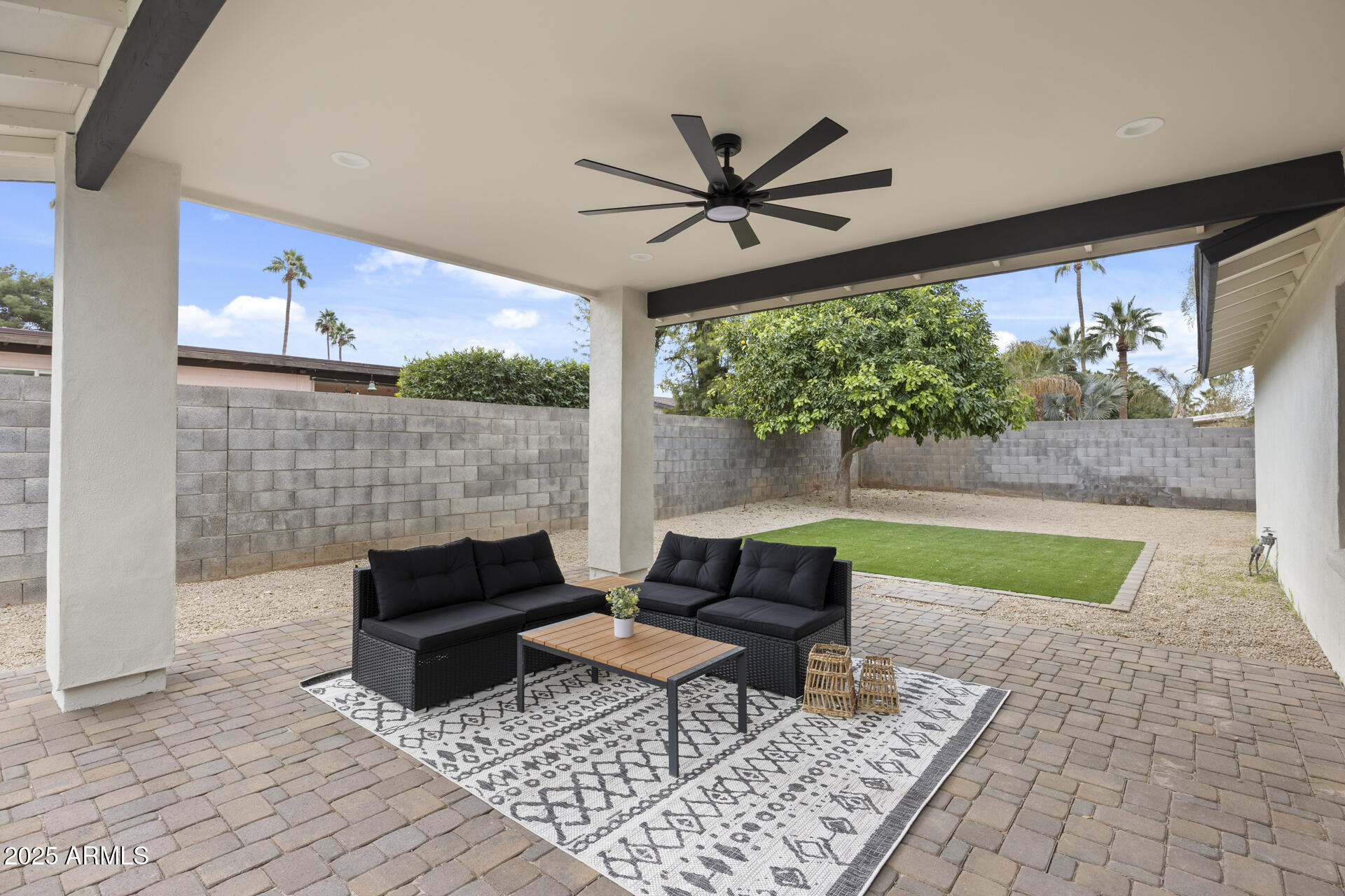 4059 East Cholla Street Phoenix, AZ 85028 - Photo 61 of 70 a outdoor living space with patio furniture and a garden