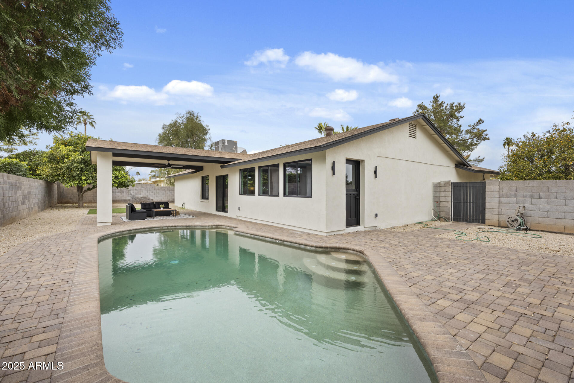 4059 East Cholla Street Phoenix, AZ 85028 - Photo 69 of 70 a front view of a house with swimming pool