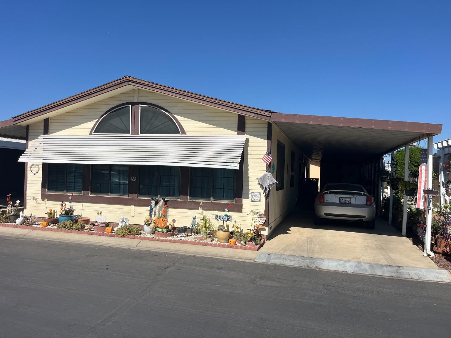 500 North Tully Road, Unit 39 Turlock, CA 95380 - Photo 2 of 23 a view of a car park in front of house