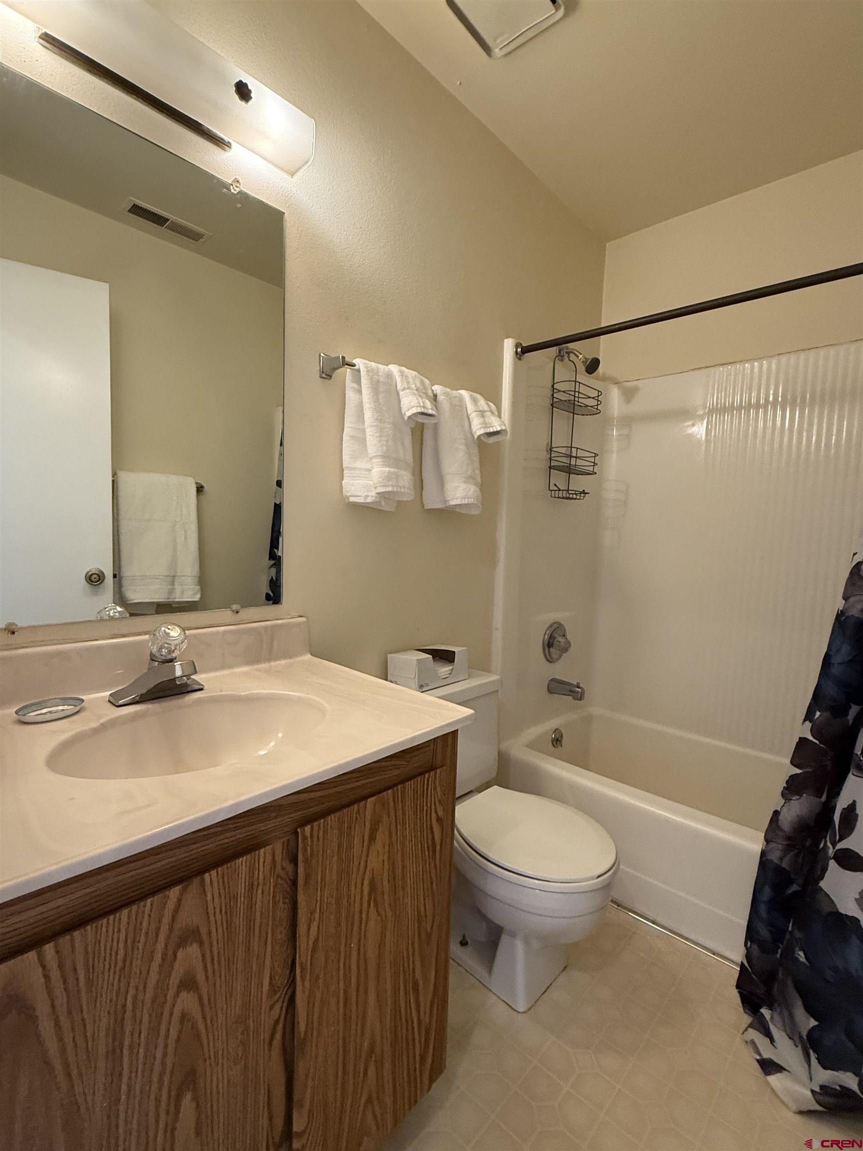 1200 Florida Road, Unit 52 Durango, CO 81301 - Photo 12 of 29 a bathroom with a sink a toilet and shower