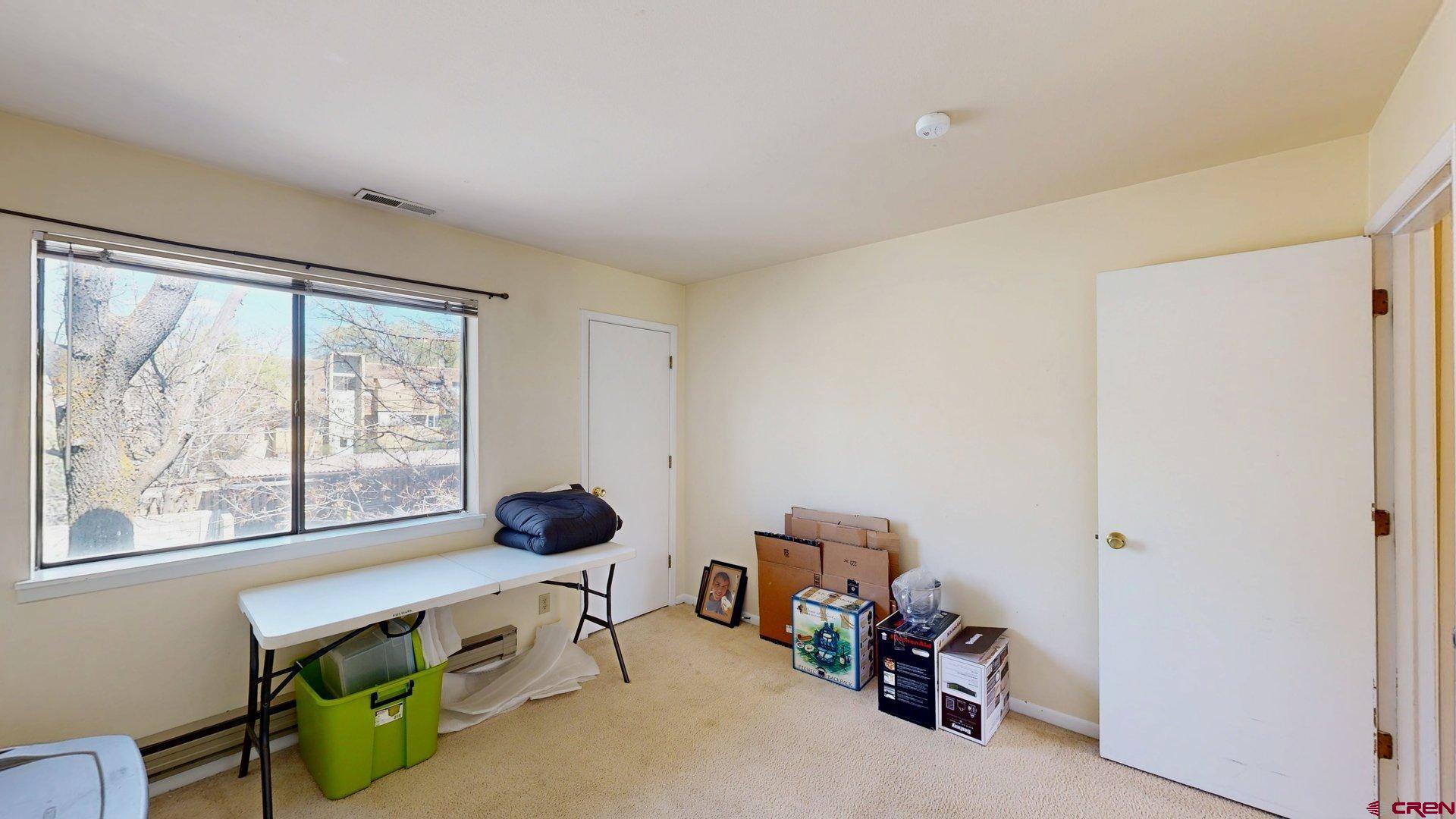 1200 Florida Road, Unit 52 Durango, CO 81301 - Photo 14 of 29 a living room with furniture and a window