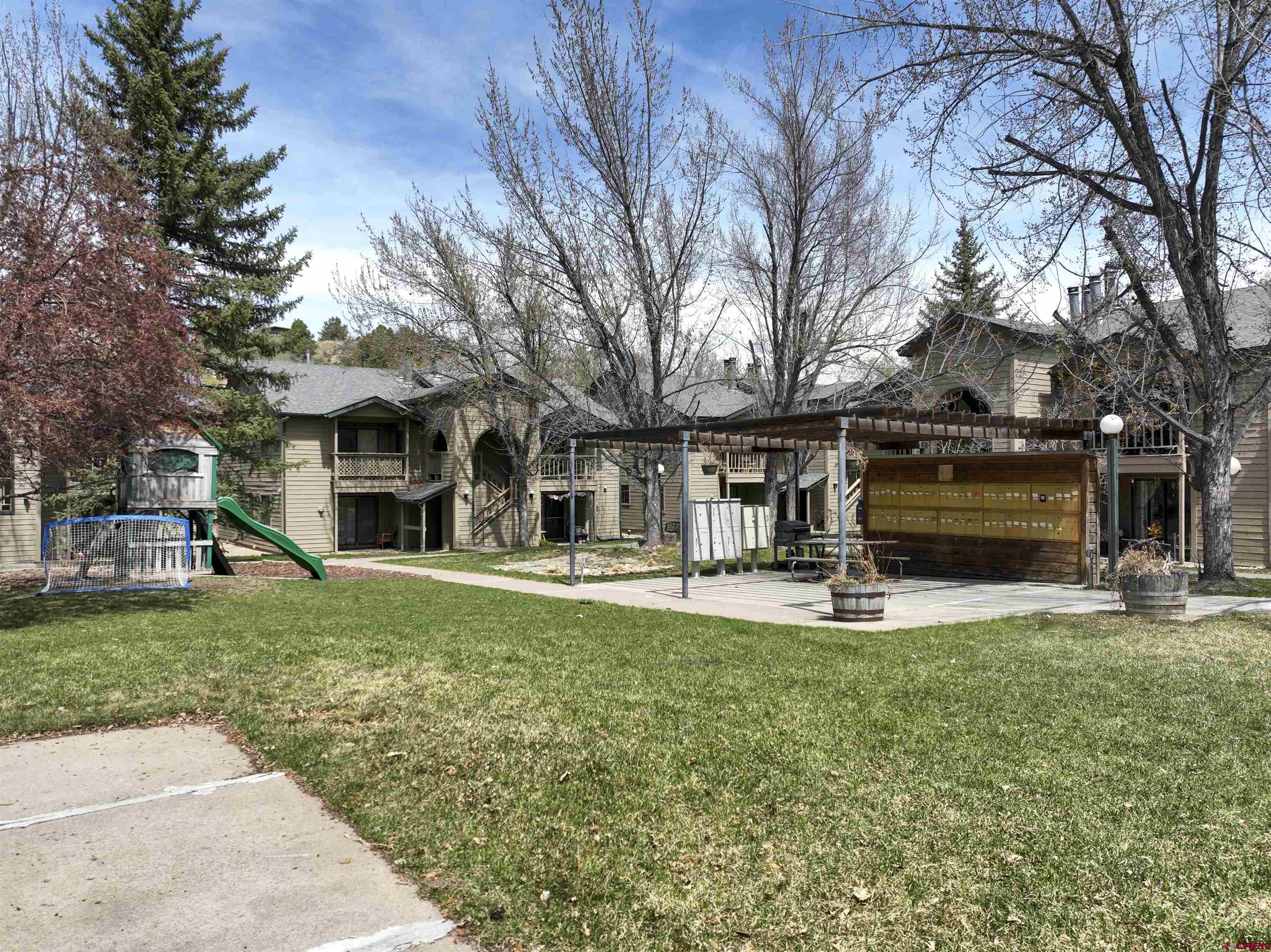 1200 Florida Road, Unit 52 Durango, CO 81301 - Photo 19 of 29 a view of a house with backyard and sitting area