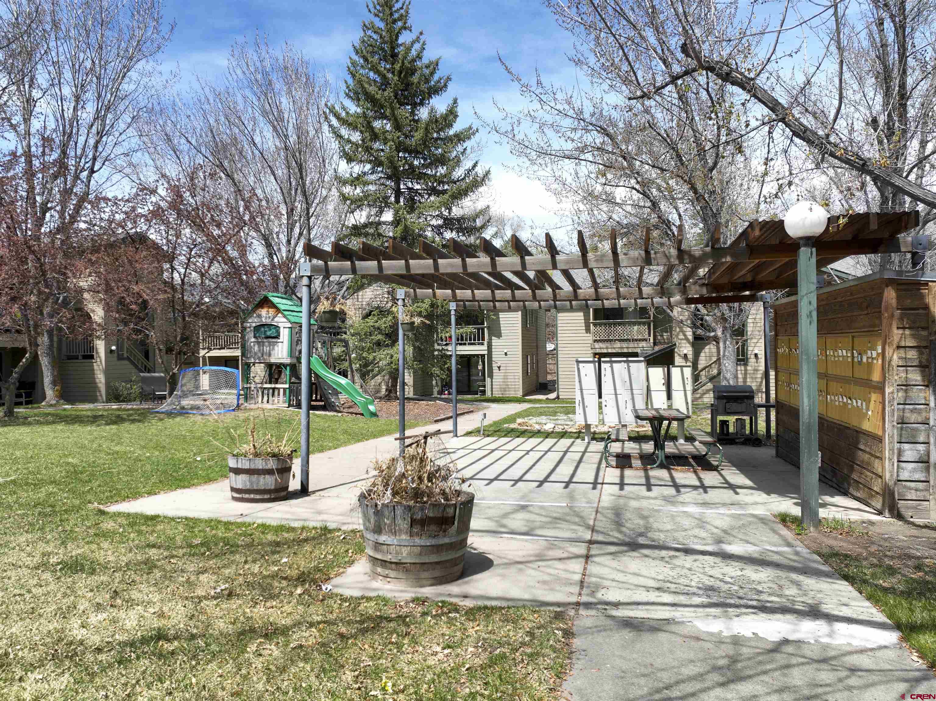 1200 Florida Road, Unit 52 Durango, CO 81301 - Photo 27 of 29 a view of a house with backyard porch and sitting area