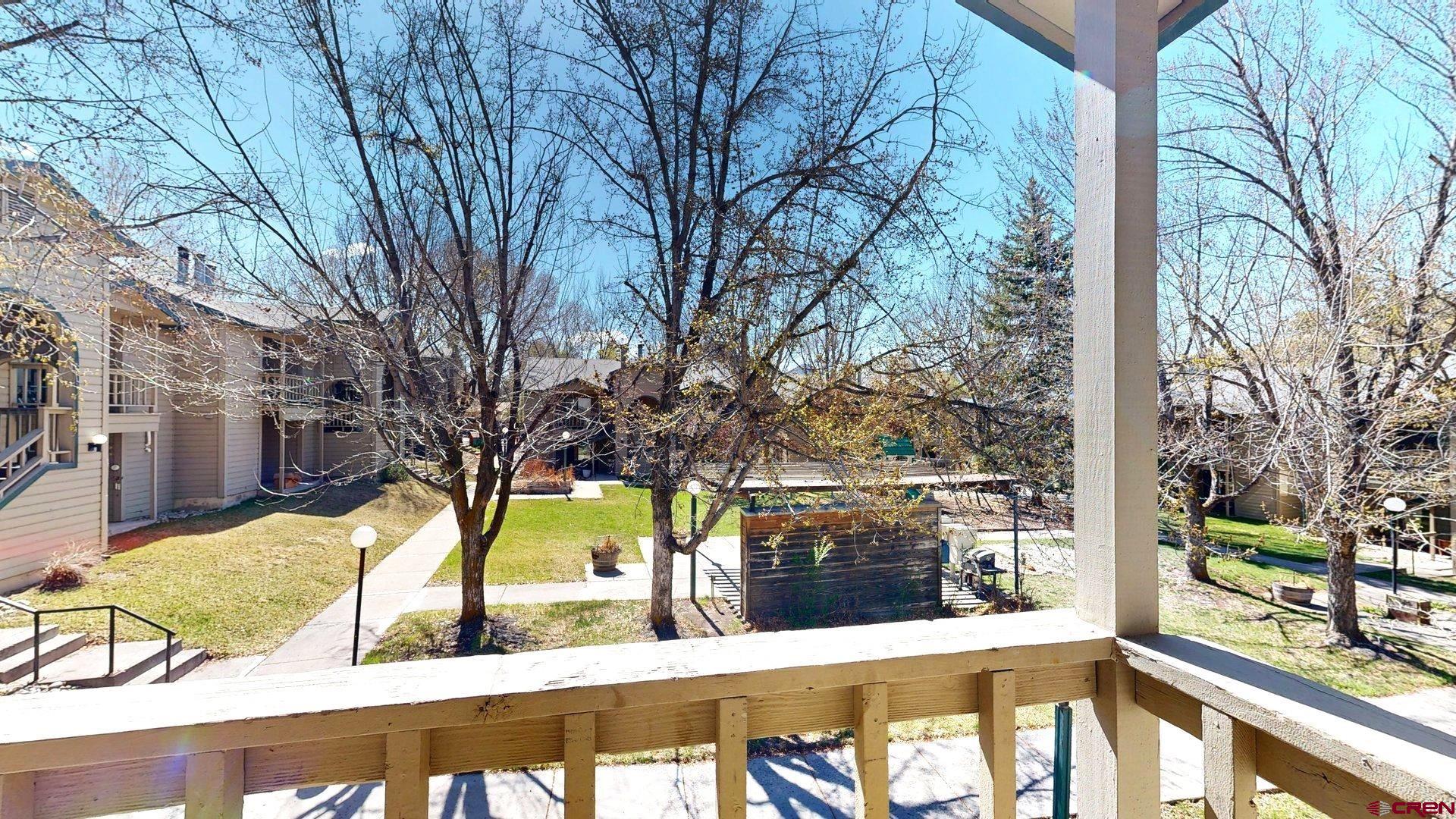 1200 Florida Road, Unit 52 Durango, CO 81301 - Photo 9 of 29 a view of a balcony with trees