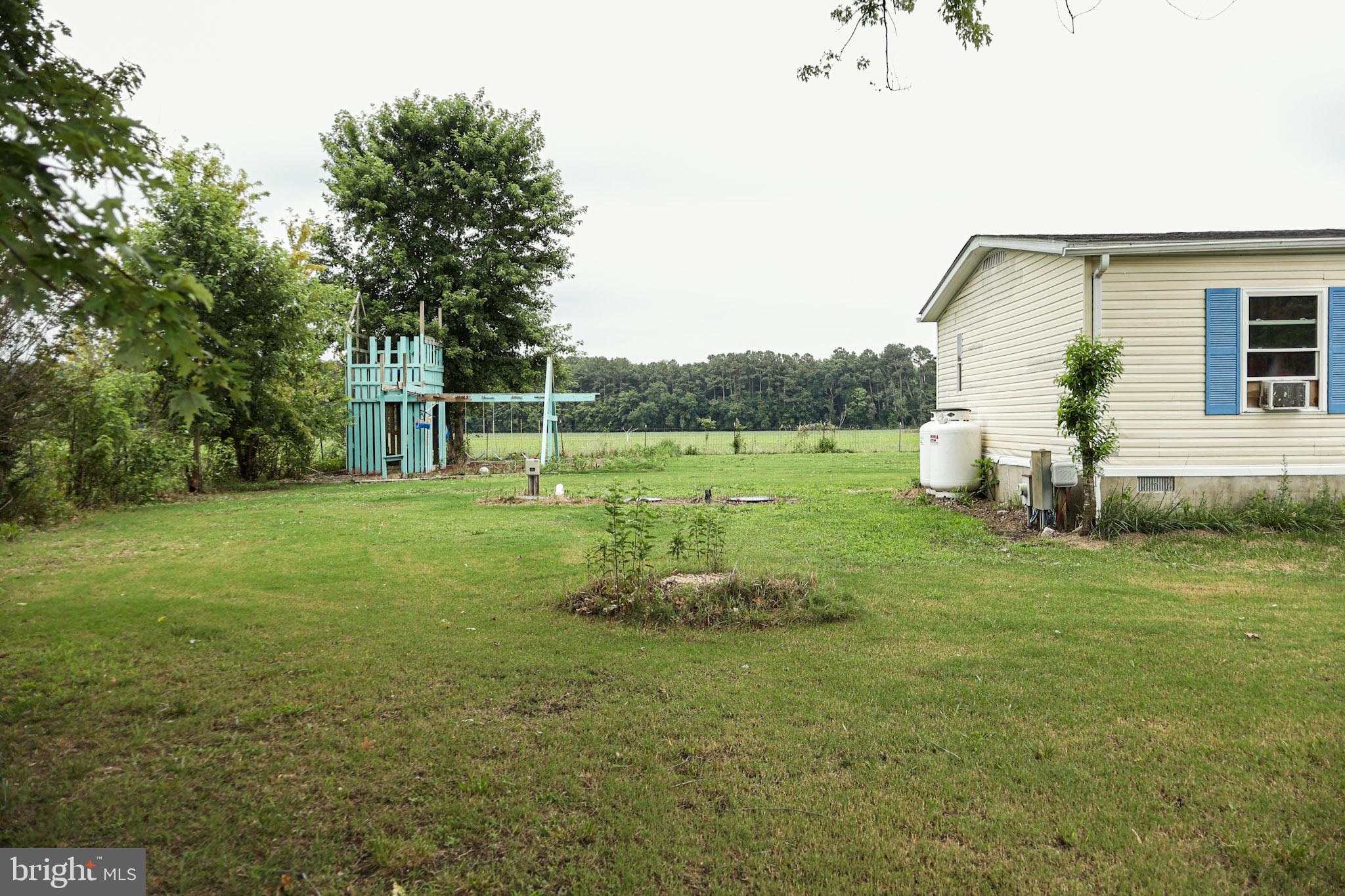 4512 Woodpecker Road Seaford, DE 19973 - Photo 31 of 32 Spacious yard with serene views.