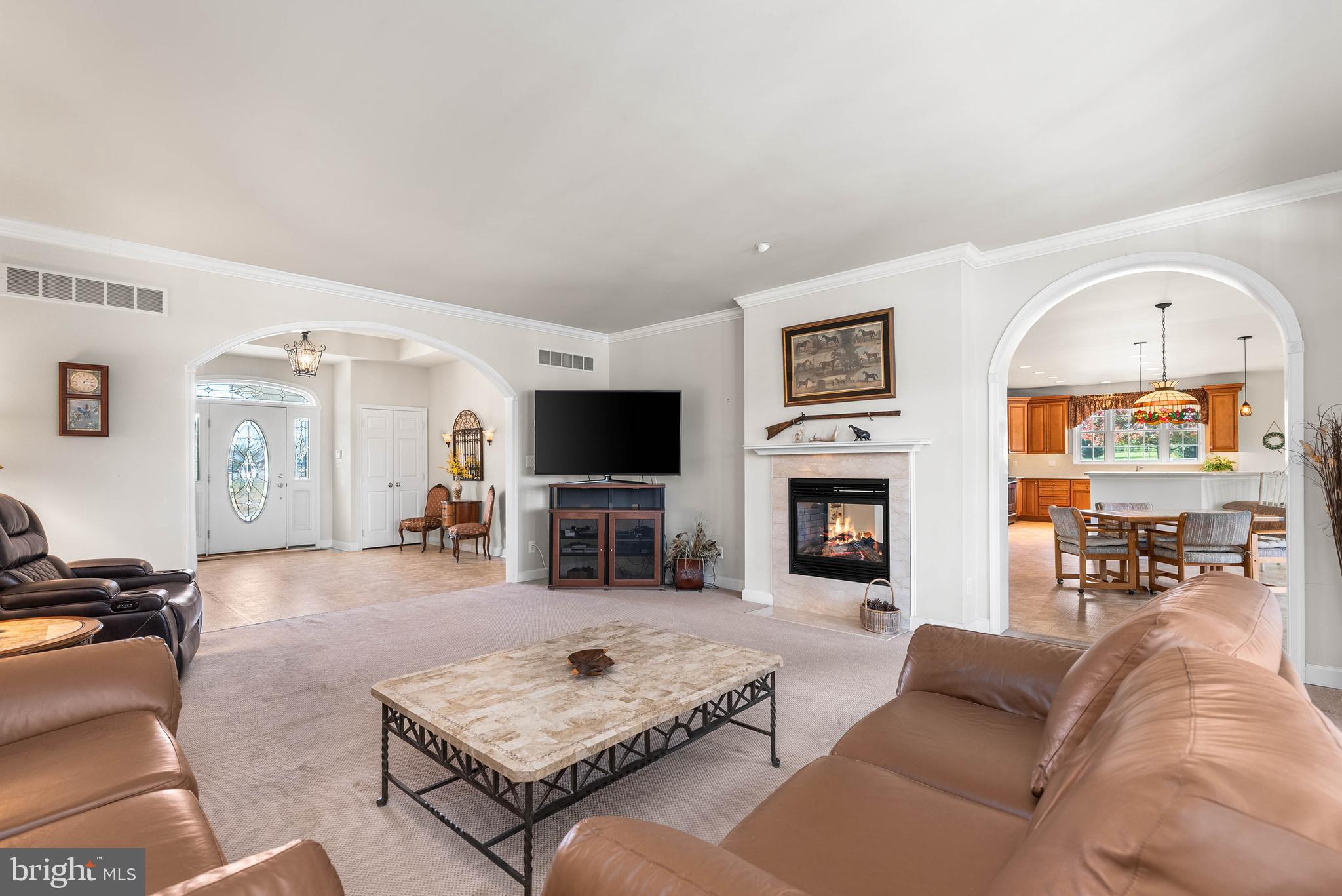 15507 Manor Road Monkton, MD 21111 - Photo 7 of 31 a living room with furniture large window and a fireplace