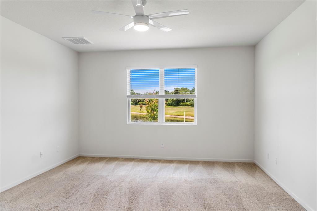 2025 Amazon Way Vero Beach, FL 32962 - Photo 13 of 33 an empty room with a empty space and window