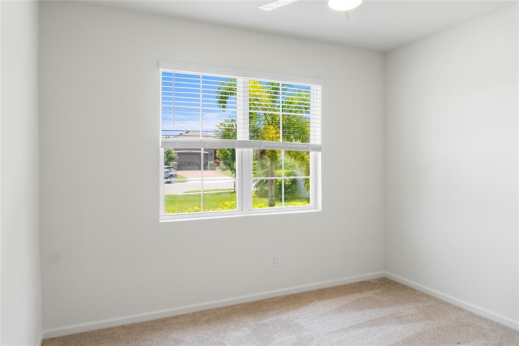 2025 Amazon Way Vero Beach, FL 32962 - Photo 16 of 33 an empty room with a window