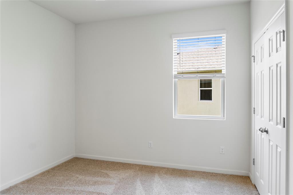 2025 Amazon Way Vero Beach, FL 32962 - Photo 22 of 33 an empty room with a window