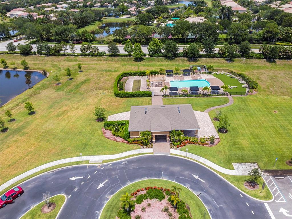 2025 Amazon Way Vero Beach, FL 32962 - Photo 28 of 33 an aerial view of a house with a swimming pool yard and outdoor seating
