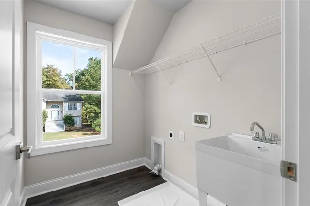 a bathroom with a sink and a window