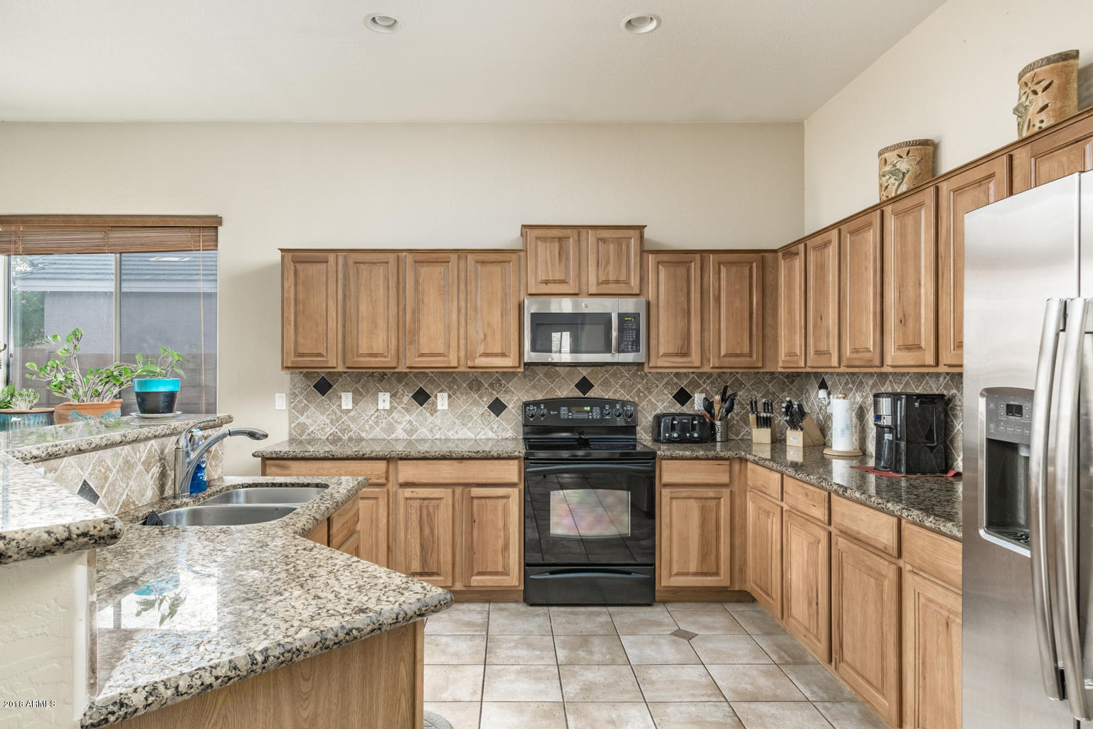 43279 West Venture Road Maricopa, AZ 85138 - Photo 5 of 22 Large kitchen, tons of cabinets