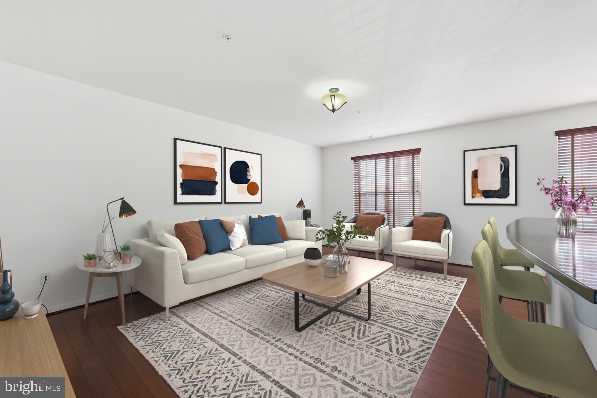 9539 Center Street Manassas, VA 20110 - Photo 11 of 41 a living room with furniture a rug and a window