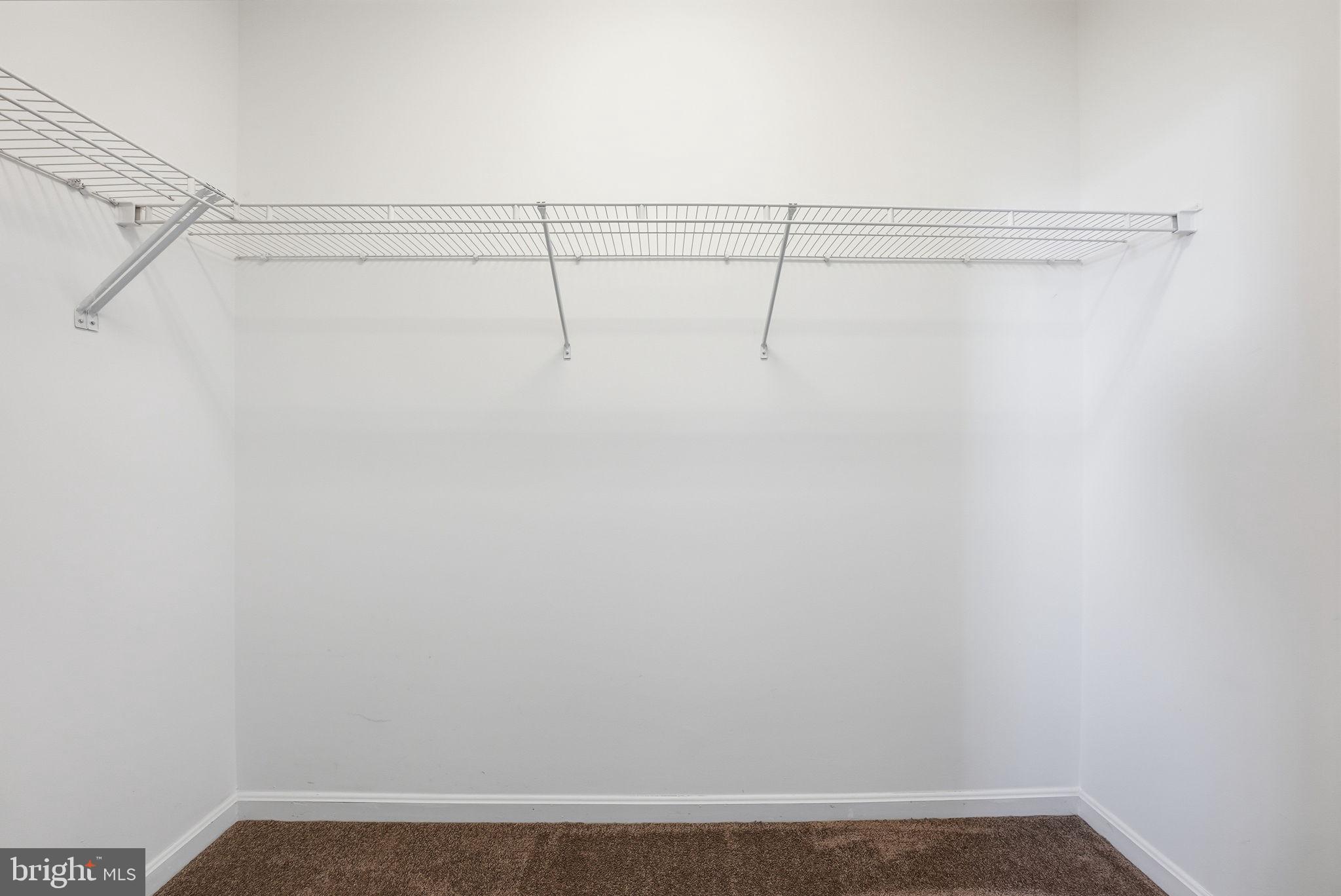 9539 Center Street Manassas, VA 20110 - Photo 25 of 41 a view of small space with racks on the wall