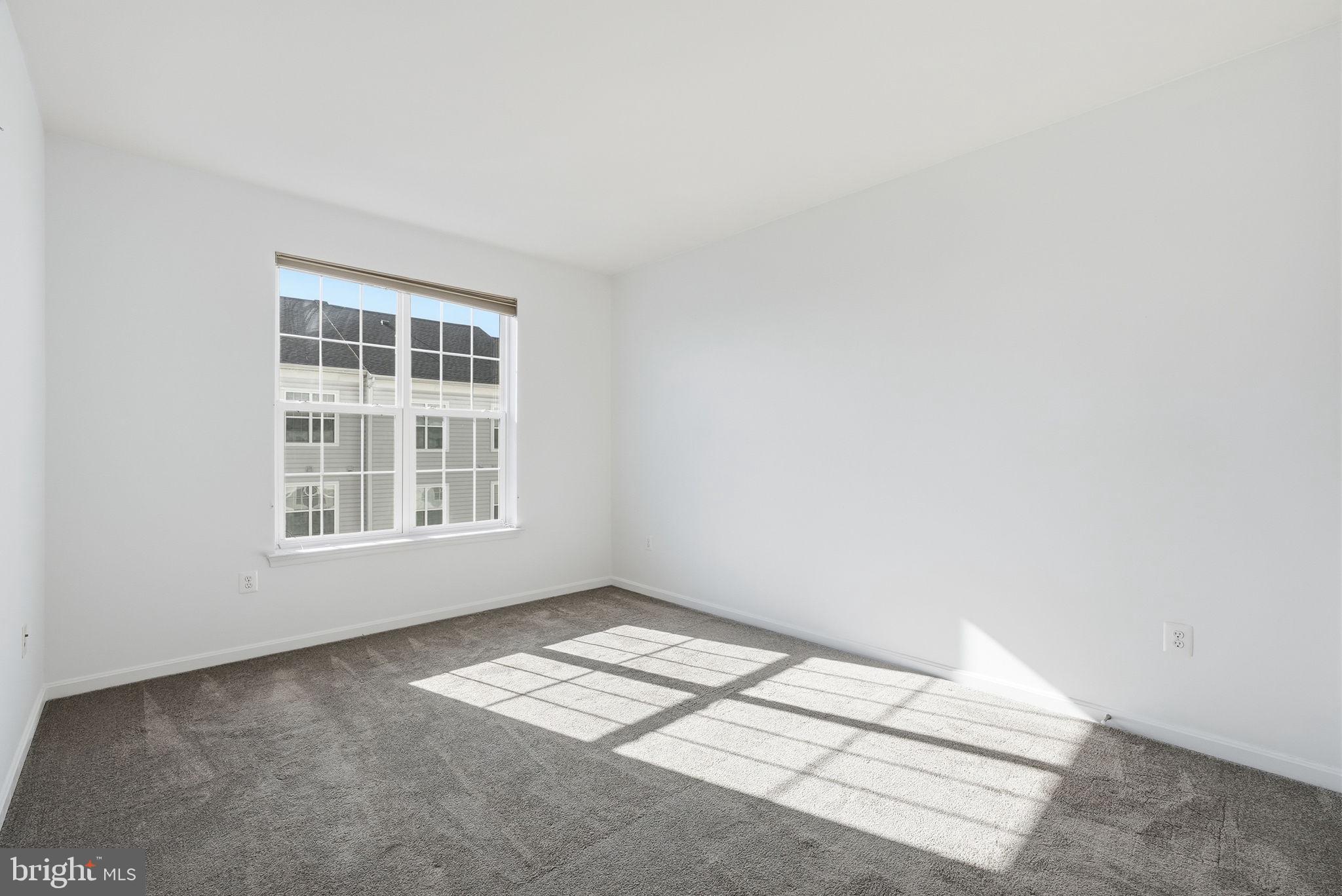 9539 Center Street Manassas, VA 20110 - Photo 31 of 41 an empty room with a window