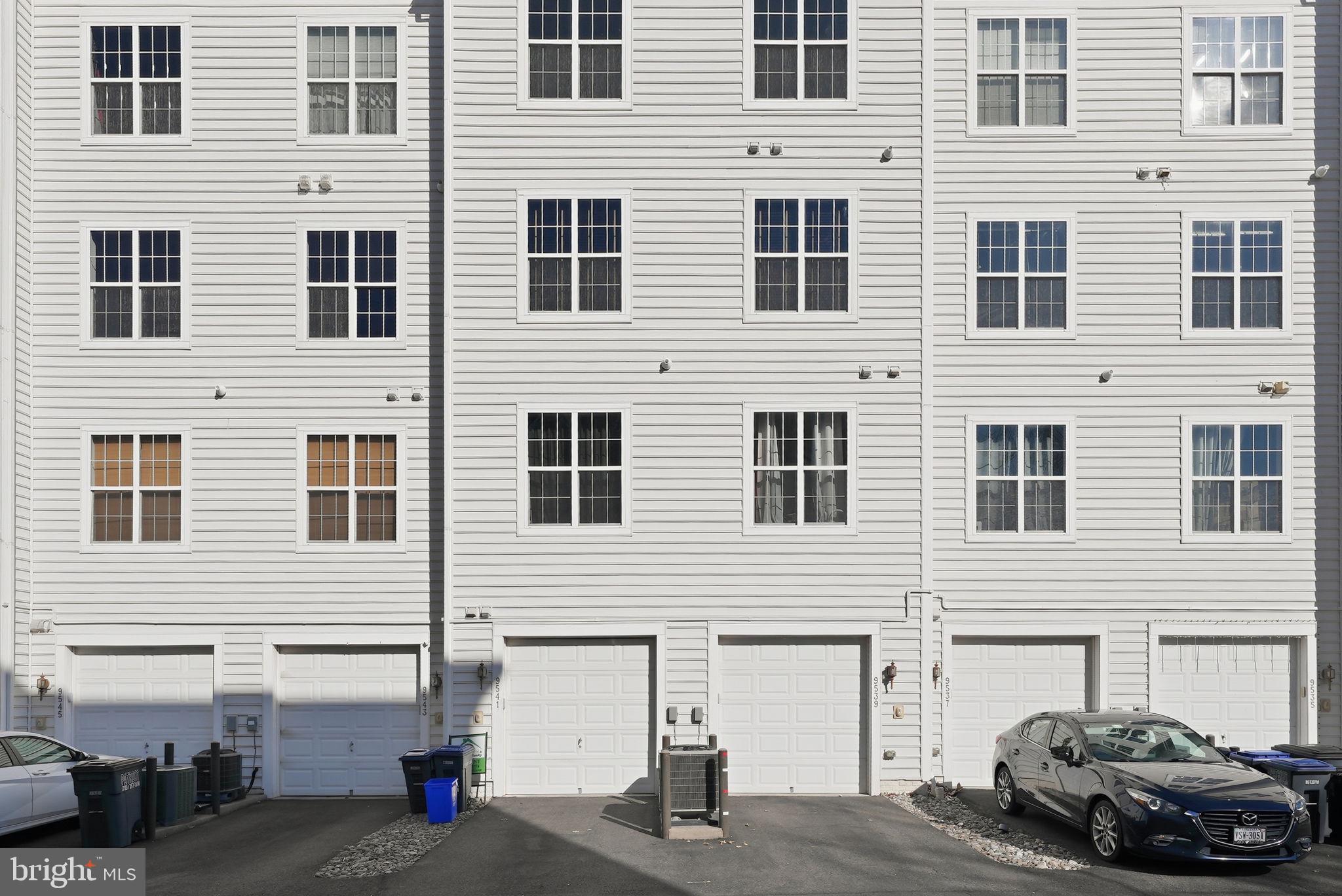 9539 Center Street Manassas, VA 20110 - Photo 37 of 41 a car parked in front of a building