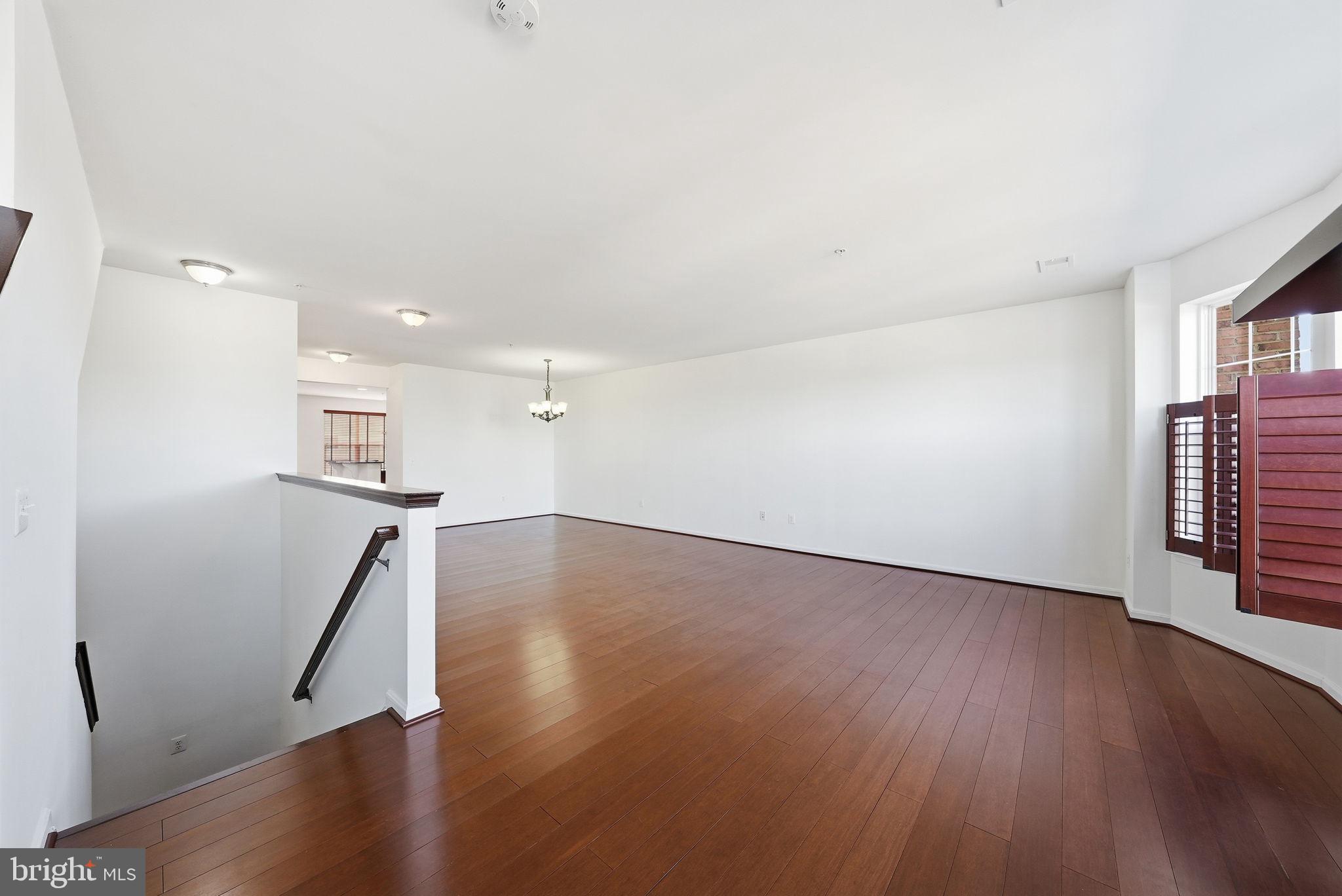 9539 Center Street Manassas, VA 20110 - Photo 6 of 40 Expansive Living Room with Updated Flooring