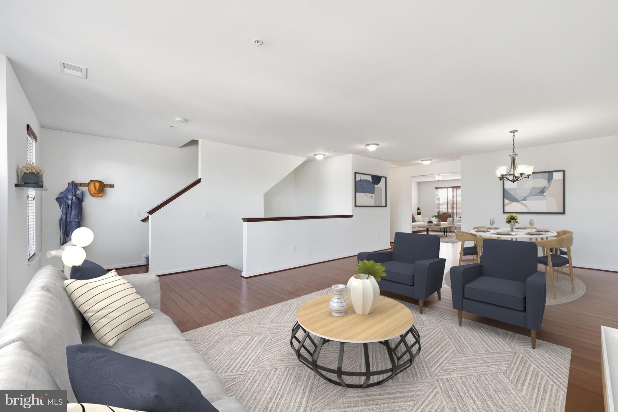 9539 Center Street Manassas, VA 20110 - Photo 7 of 41 a living room with furniture and a wooden floor