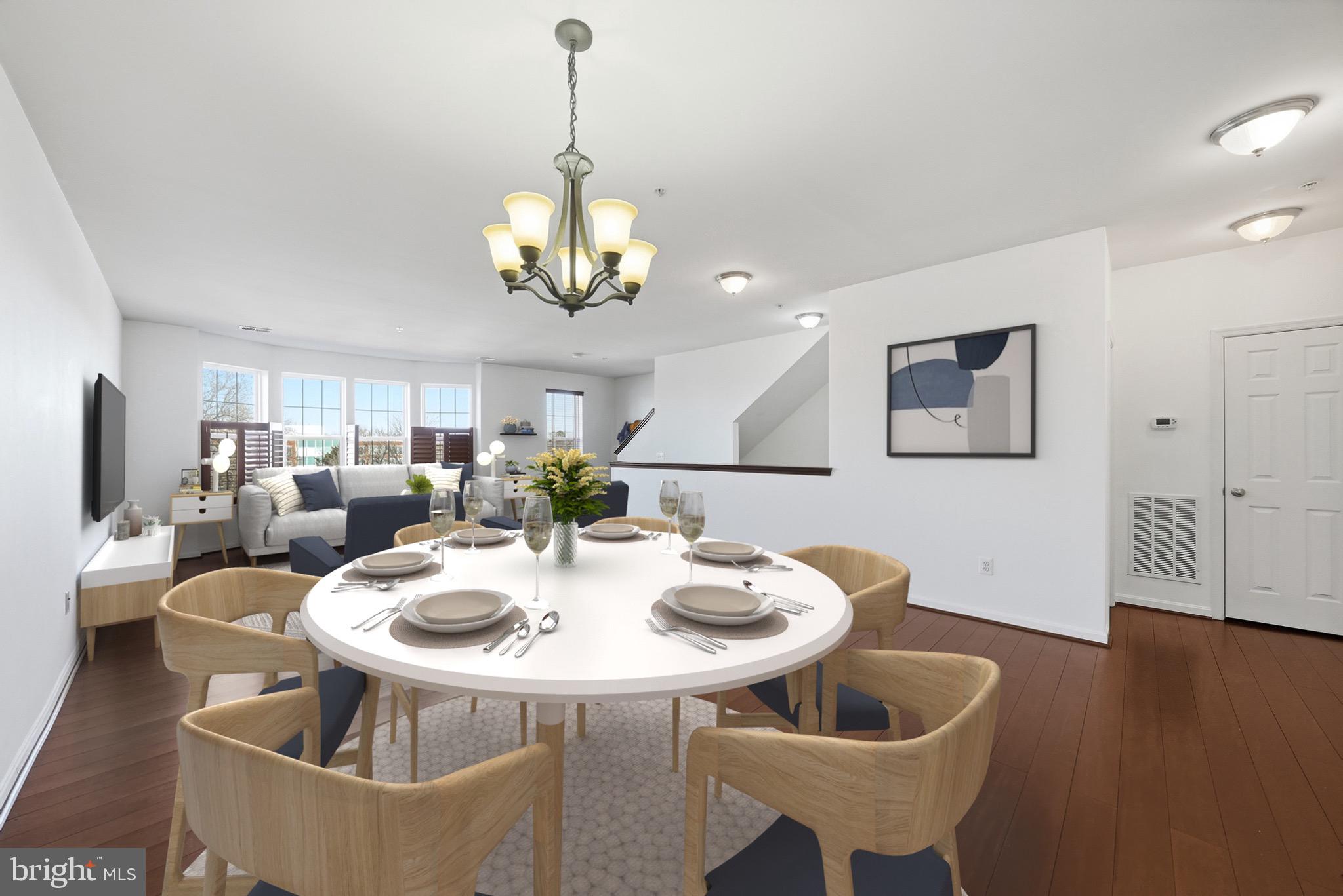 9539 Center Street Manassas, VA 20110 - Photo 8 of 41 a view of a dining room with furniture and wooden floor