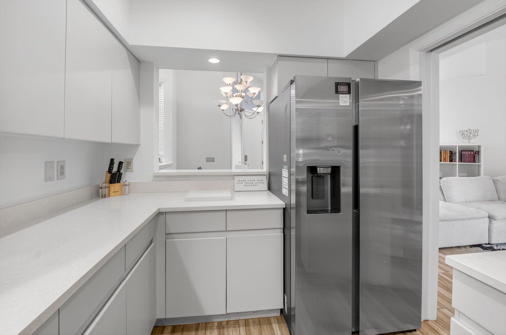 2225 Northwest 53rd Street Boca Raton, FL 33496 - Photo 14 of 46 a kitchen with a sink stainless steel appliances and cabinets