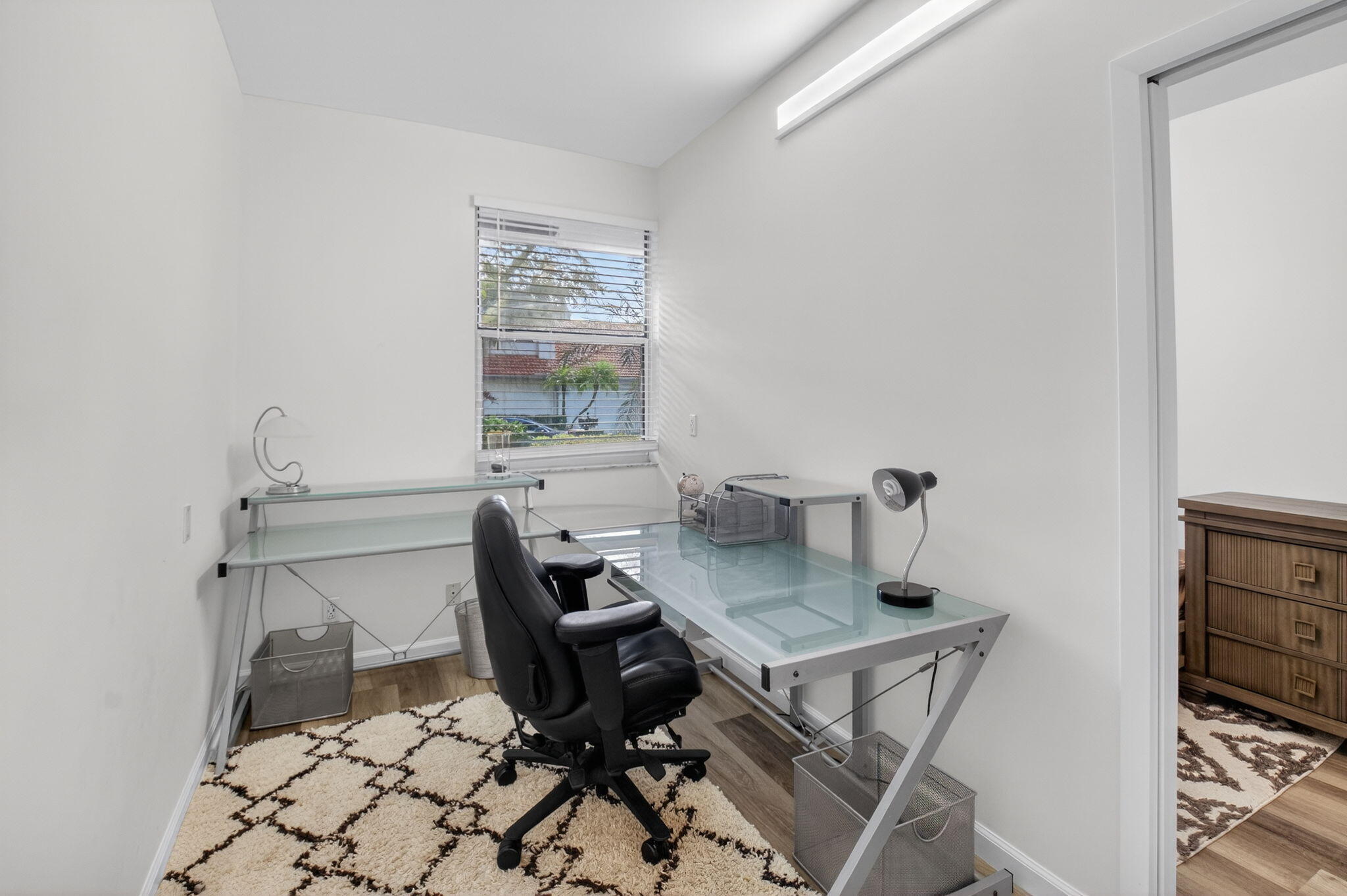 2225 Northwest 53rd Street Boca Raton, FL 33496 - Photo 24 of 46 a workspace with furniture and a window