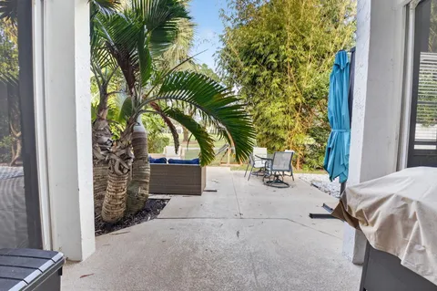 a backyard of a house with seating space