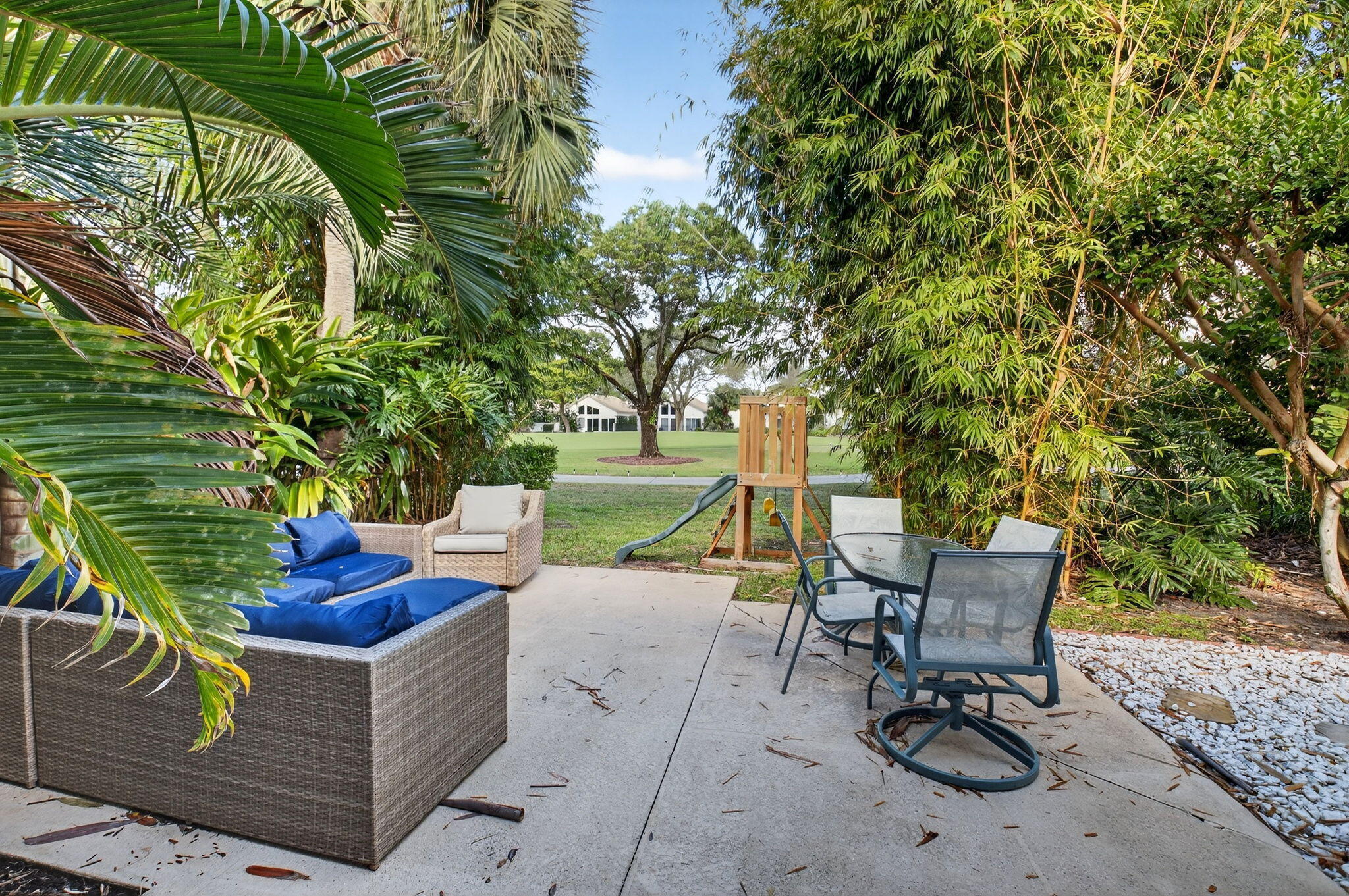 2225 Northwest 53rd Street Boca Raton, FL 33496 - Photo 27 of 46 a view of a backyard with sitting area and furniture