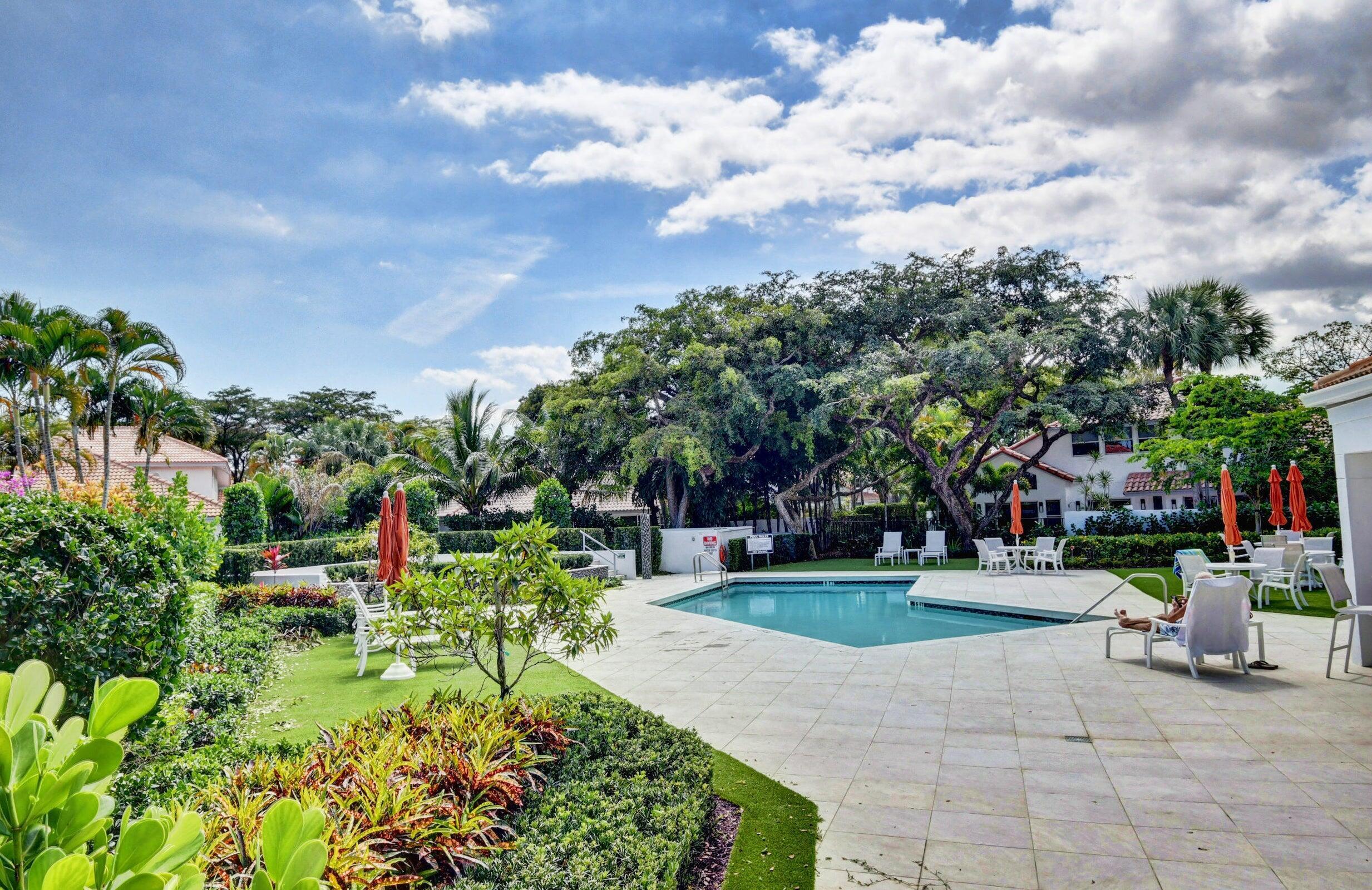 2225 Northwest 53rd Street Boca Raton, FL 33496 - Photo 34 of 46 a view of a garden with sitting area