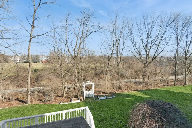 a view of wooden deck and a trees