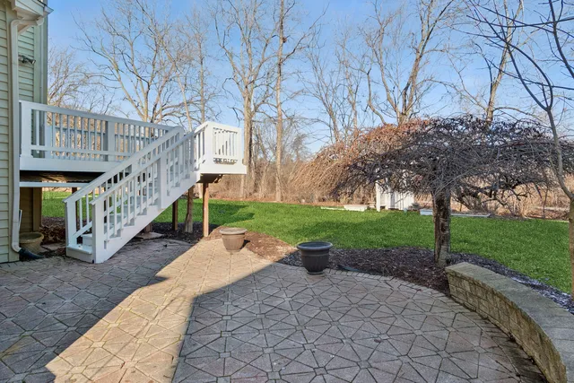 a front view of house with yard and outdoor seating