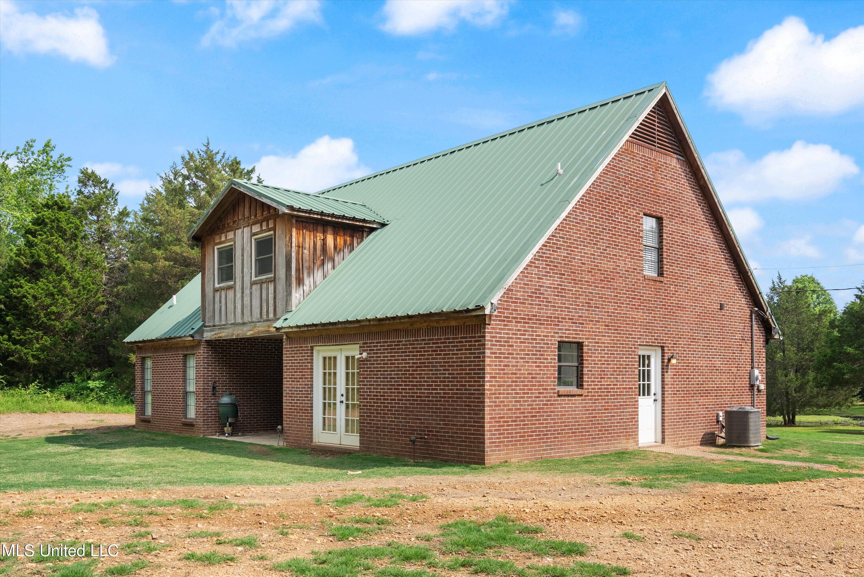 1831 Hammond Hill Road Como, MS 38619 - Photo 28 of 32 28-Rear Exterior - Copy