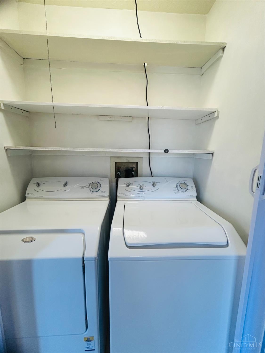 8122 Timbertree Way Beckett Ridge, OH 45069 - Photo 25 of 36 The laundry room adjacent to the kitchen adds convenience