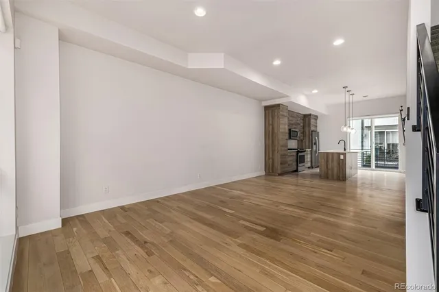 an empty room with closet area