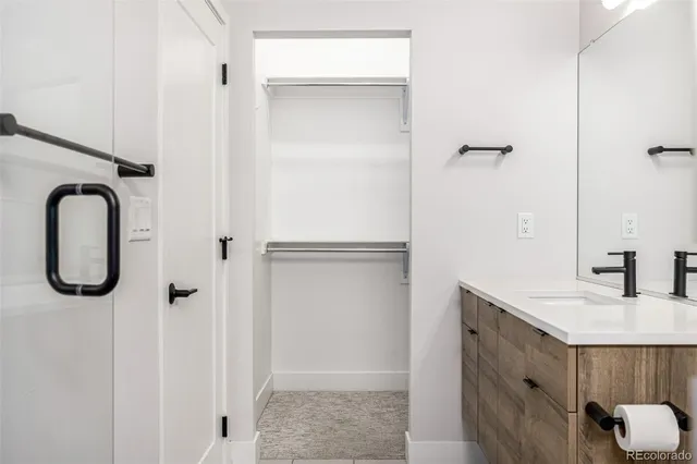 a view of a room with racks on the wall