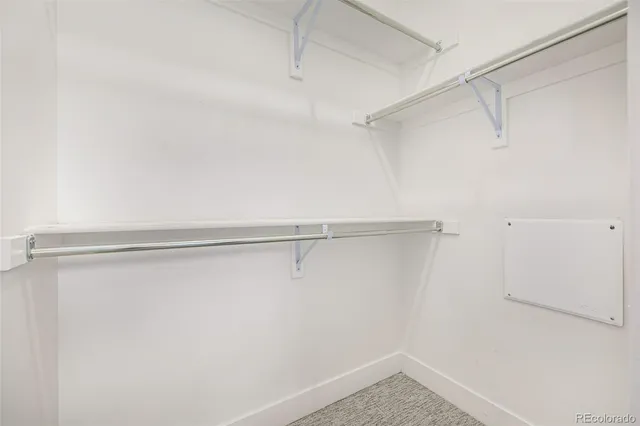 a view of empty room with windows