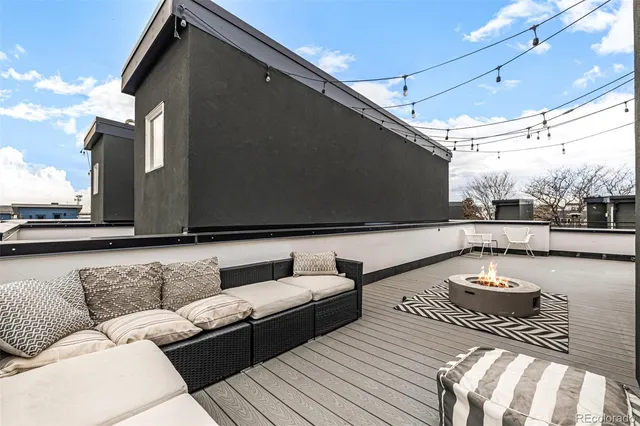 a view of roof deck with seating space
