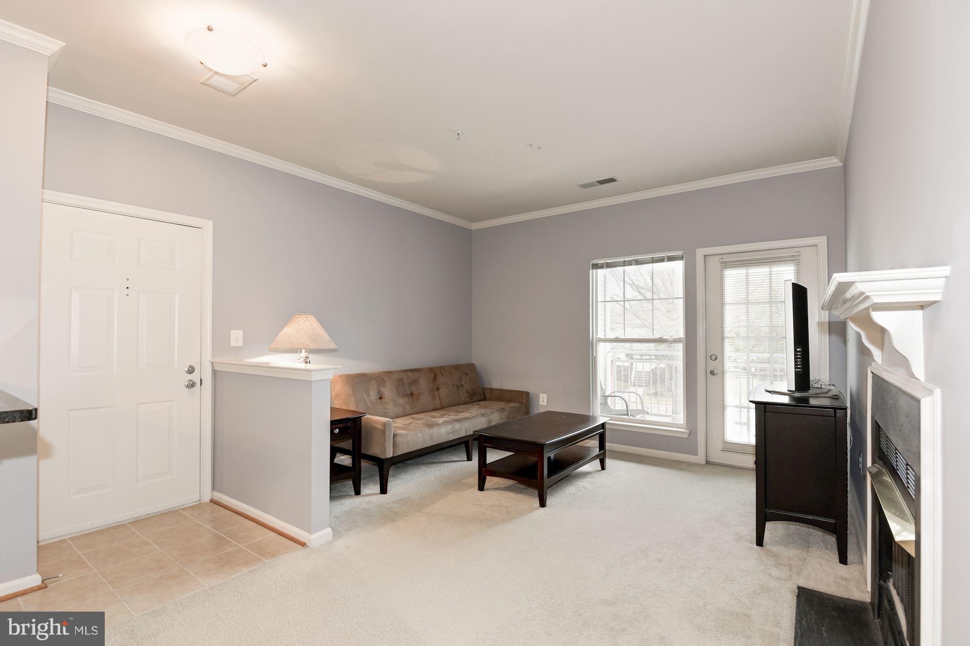 1509 North Point Drive, Unit 201 Reston, VA 20194 - Photo 4 of 19 Living Room